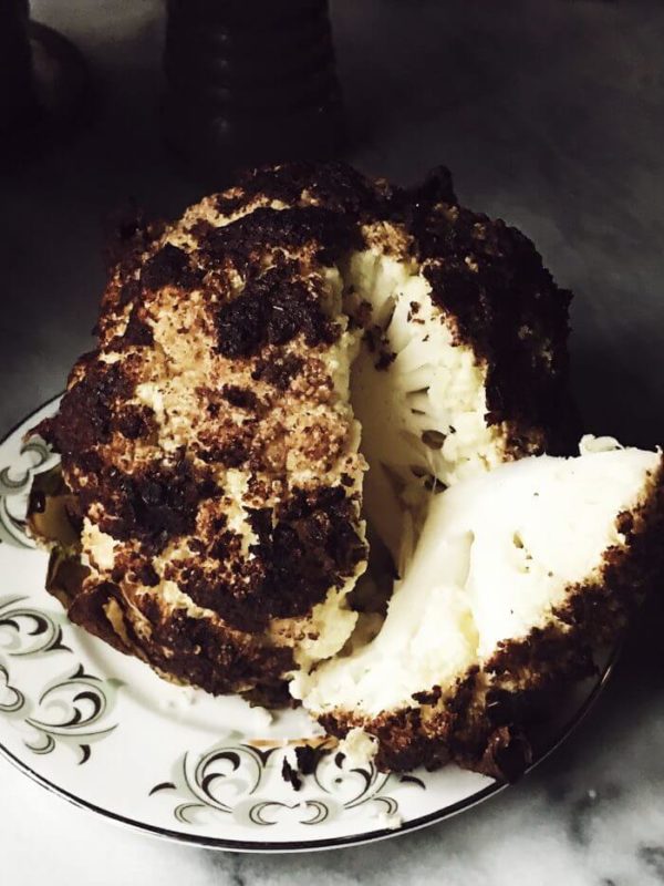 Whole roasted cauliflower recipe with oregano, capers and olives