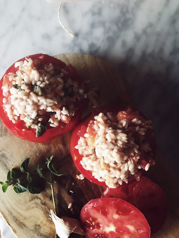 Roasted, rice stuffed tomatoes: one of the most popular Roman food recipes. Get this and more delicious and authentic Italian recipes on Gourmet Project.