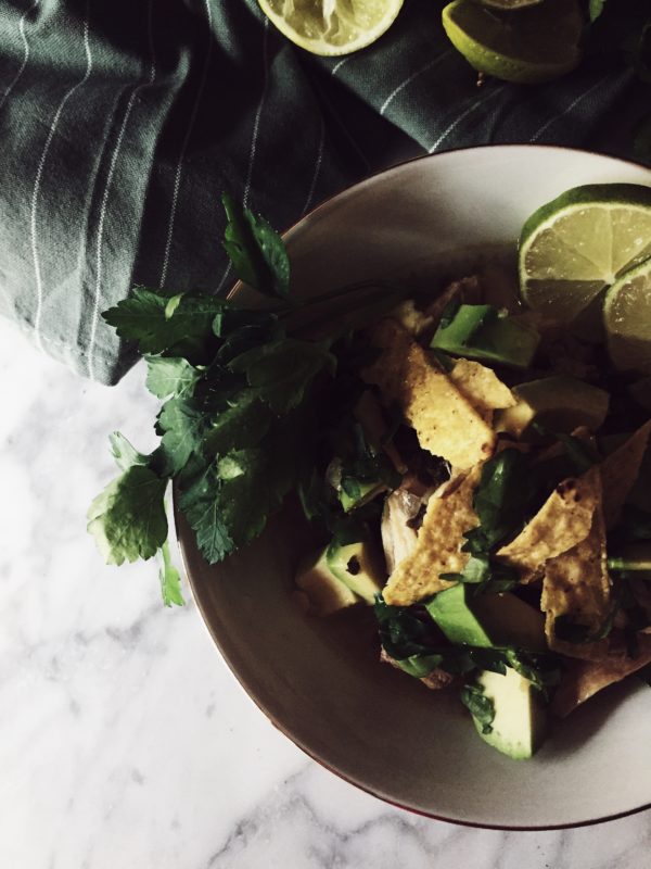 A sopa de lima recipe in a wintry, orang-y version: hot broth, fresh avocado and crispy tortilla fries.