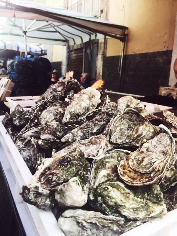 About Ortygia’s foodtrotting: one of the must see things (and maybe my favorite) there is the fish market. You will be entertained by singing fishers, amazed by the beauty of food and delighted by fresh oysters and cold white wine.