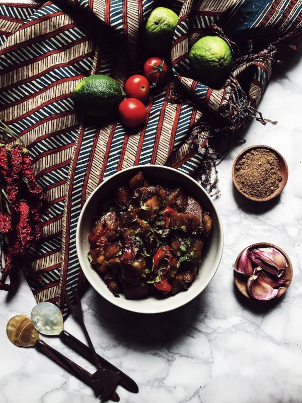 An asian stir fry recipe: wok fried eggplants seasoned with soy sauce, tomato and lime zest. Get this and more balinese recipes on Gourmet Project.