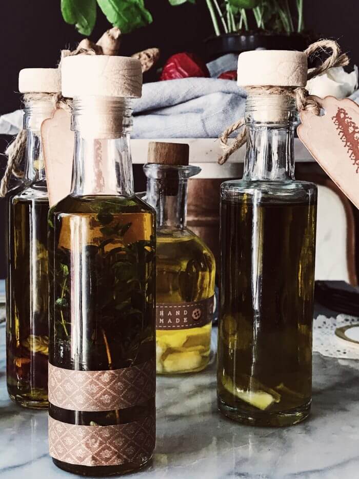 infused olive oil #gourmetproject #italianrecipes How to infuse olive oil with herbs: 5 recipes from an Italian kitchen. Learn how to make infused olive oil and never buy it again.