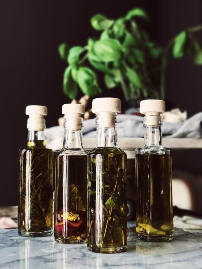 four bottles of flavored olive oil - homemade Christmas gifts