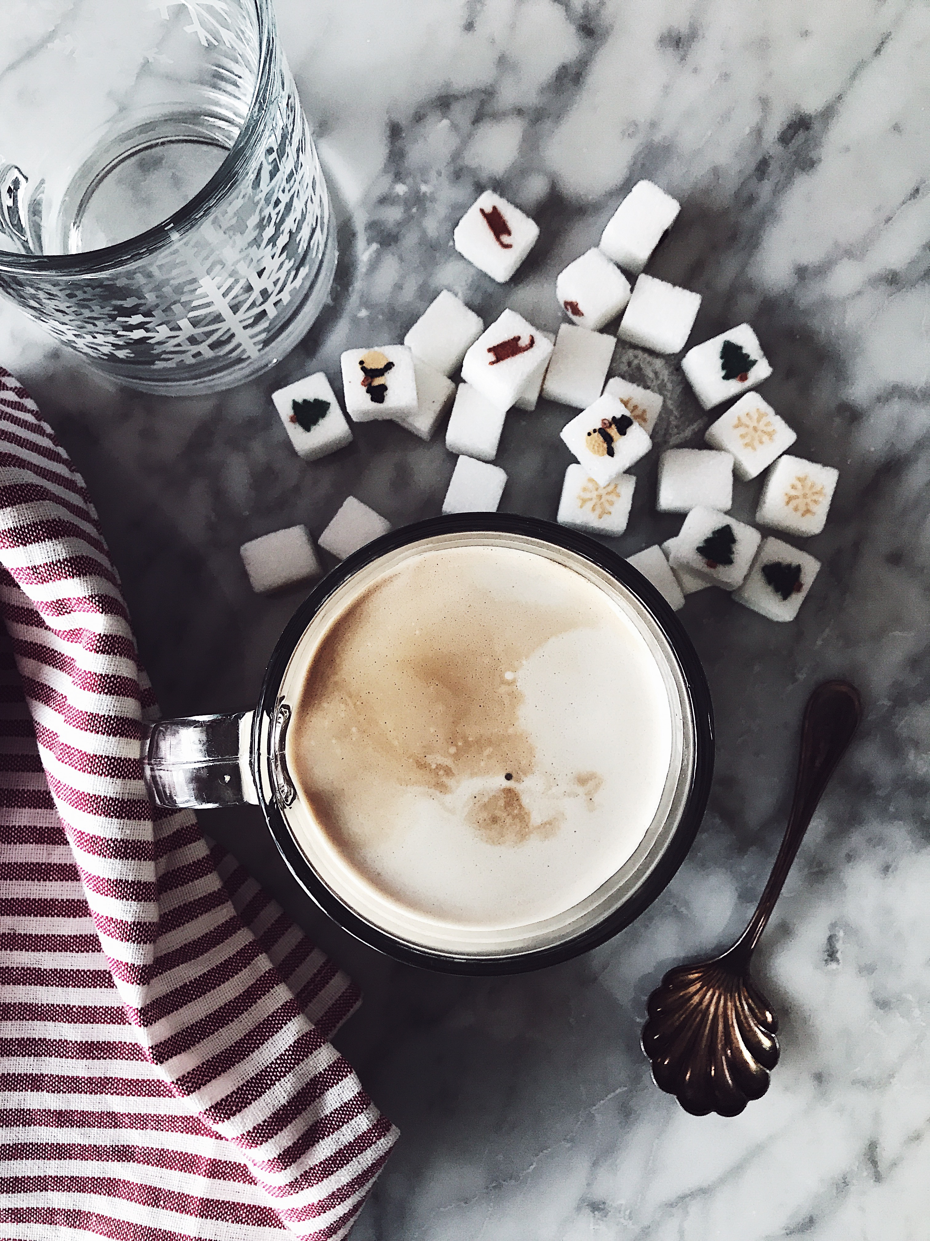 latte macchiato recipe with decorated sugar cubes