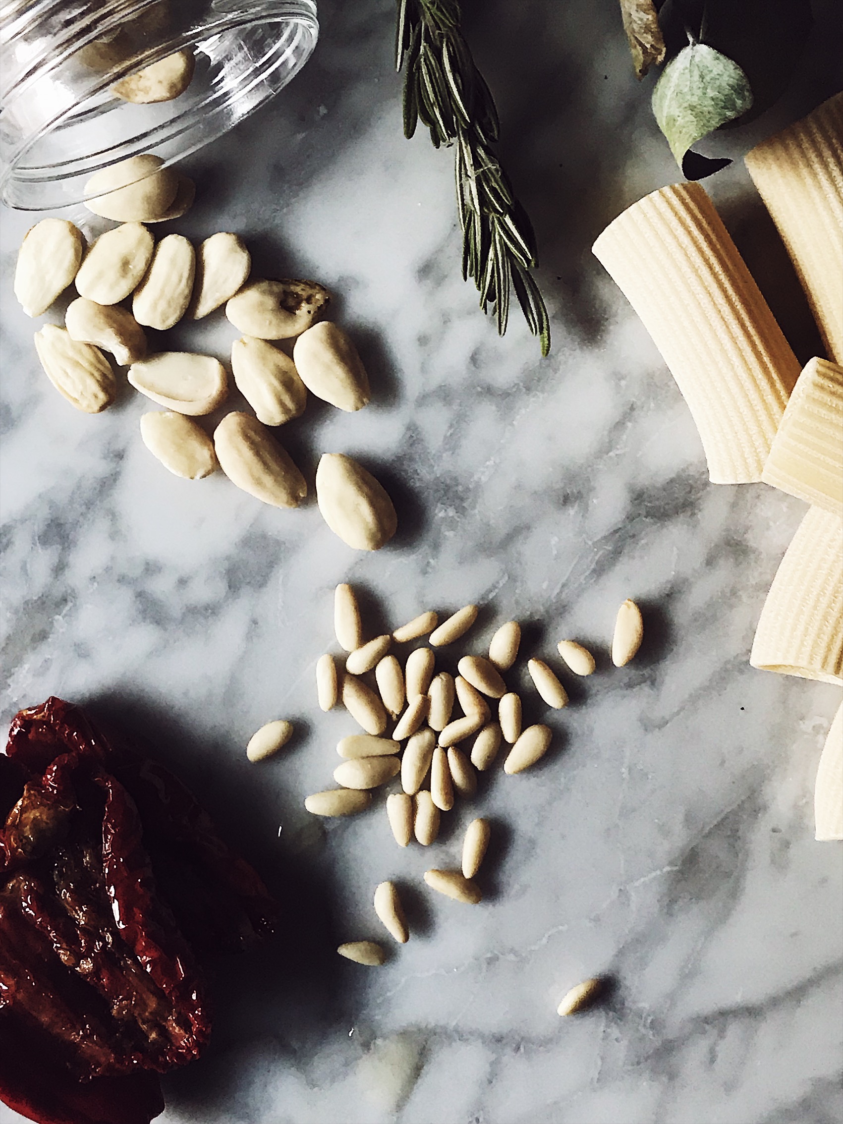 pesto with sun dried tomatoes recipe ingredients: dried tomatoes, pine nuts, almonds, and rosemary