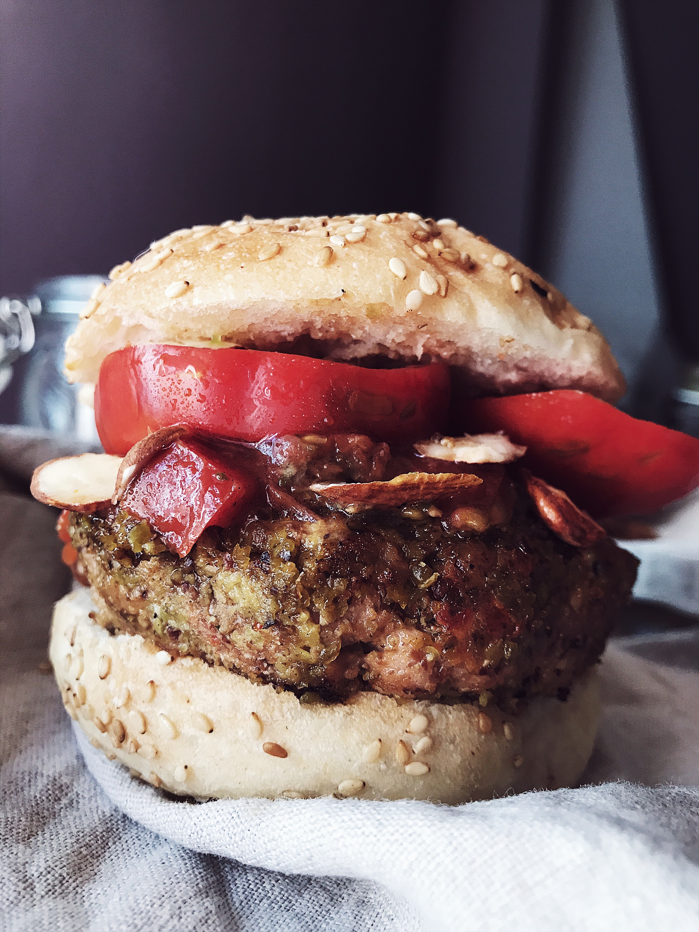 Healthy and easy grilled fresh tuna burgers recipe with mint, almonds, pistachios, and fresh and dried tomatoes. #italianrecipes