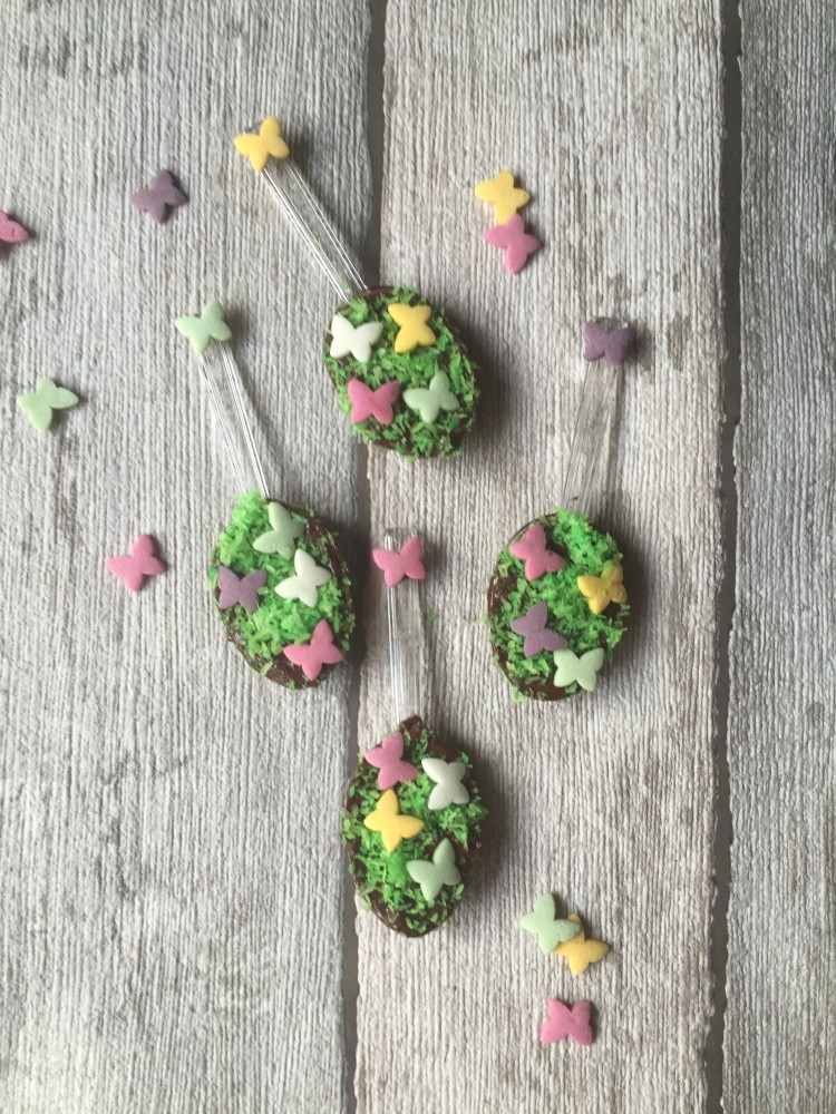 chocolate spoons diy with green grass and butterfly confetti