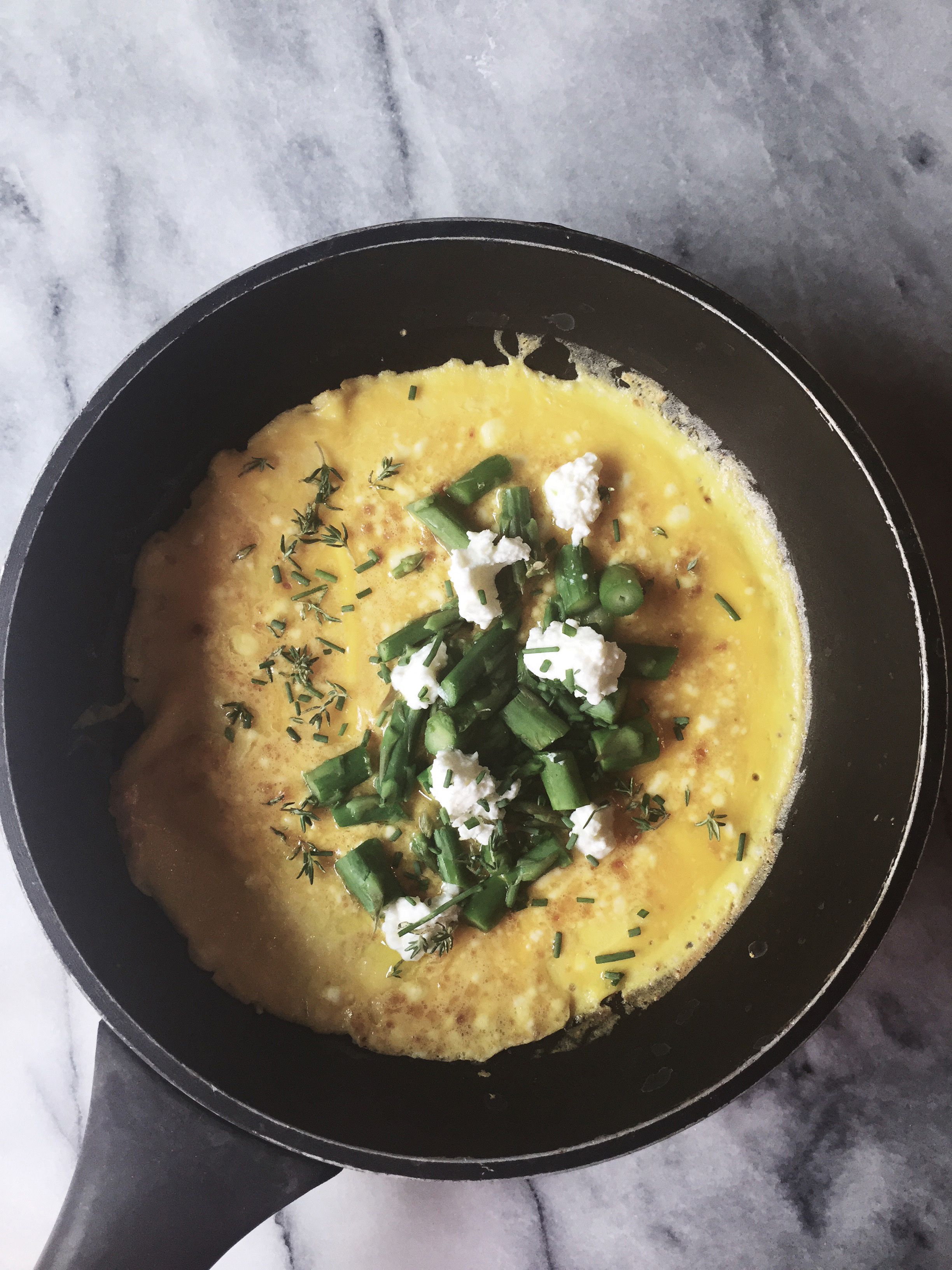 asparagus omelette with soft ricotta, chives and thyme