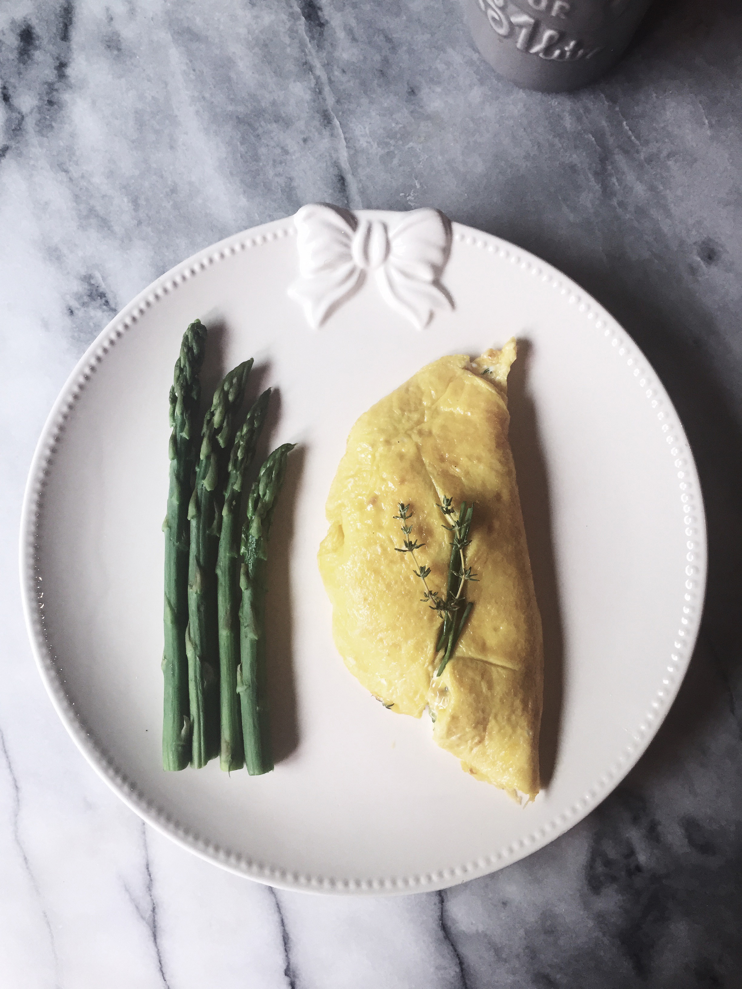 an asparagus omelette recipe with soft ricotta, chives and thyme