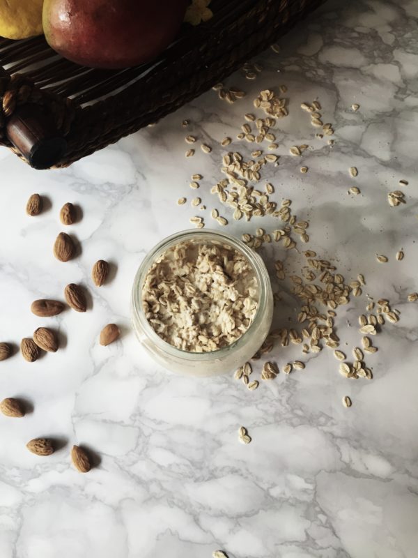 the super-healthy, overnight fermented oatmeal recipe, made with mango and chopped almonds