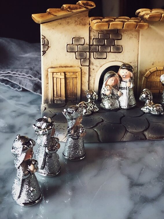 Italian Christmas presepe tradition with silver statuettes