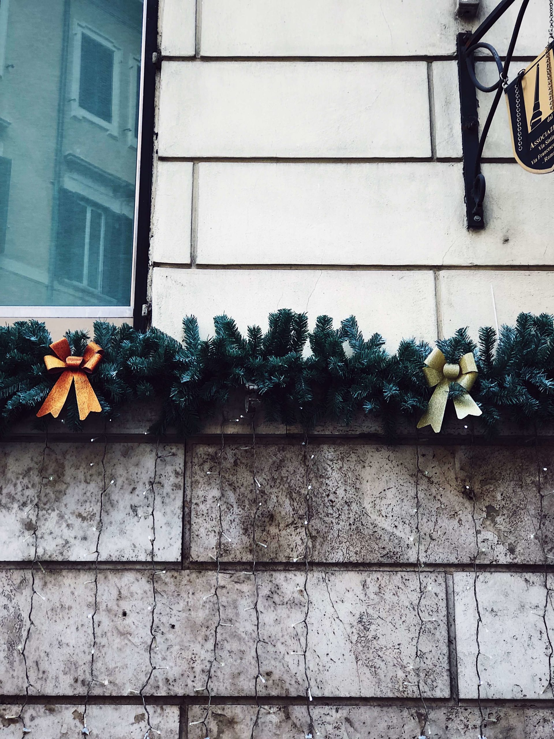 Christmas street decorations in Rome made with bows