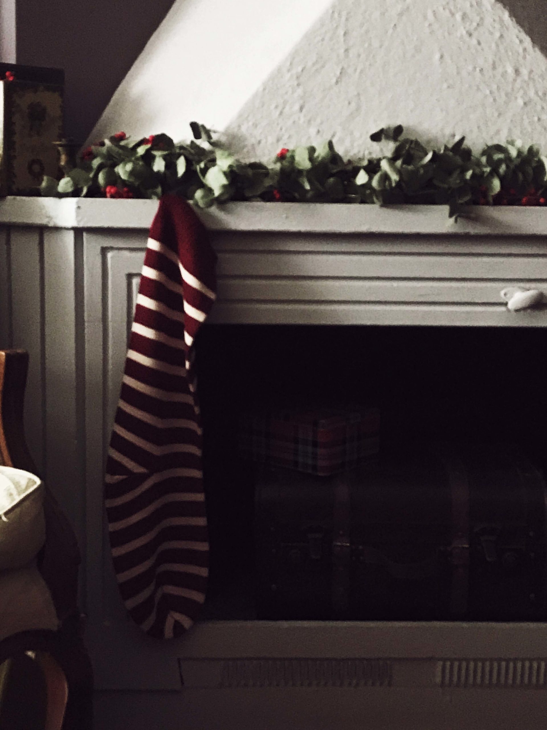 Christmas stocking hanging near the fireplace