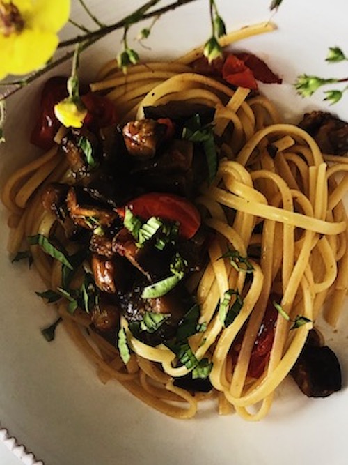 smashed garlic clove for the Italian eggplant pasta sauce recipe