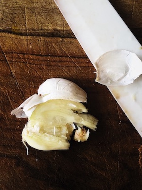 smashed garlic for an easy Italian eggplant pasta sauce