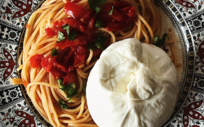 Italian pasta with burrata and cherry tomatoes