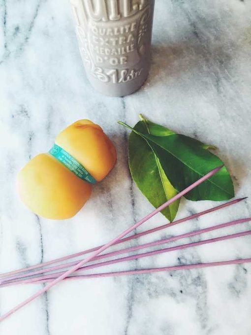 scamorza cheese, skewers, and lemon leaves